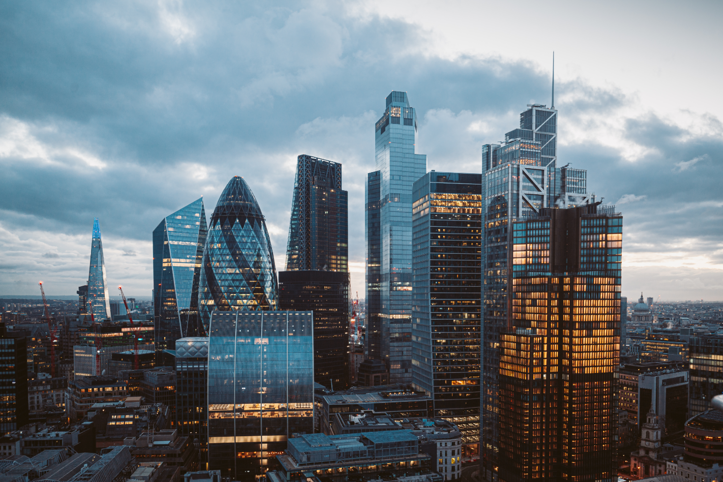 A captivating dusk view of the city of London, showcasing its stunning skyline and the fading daylight.