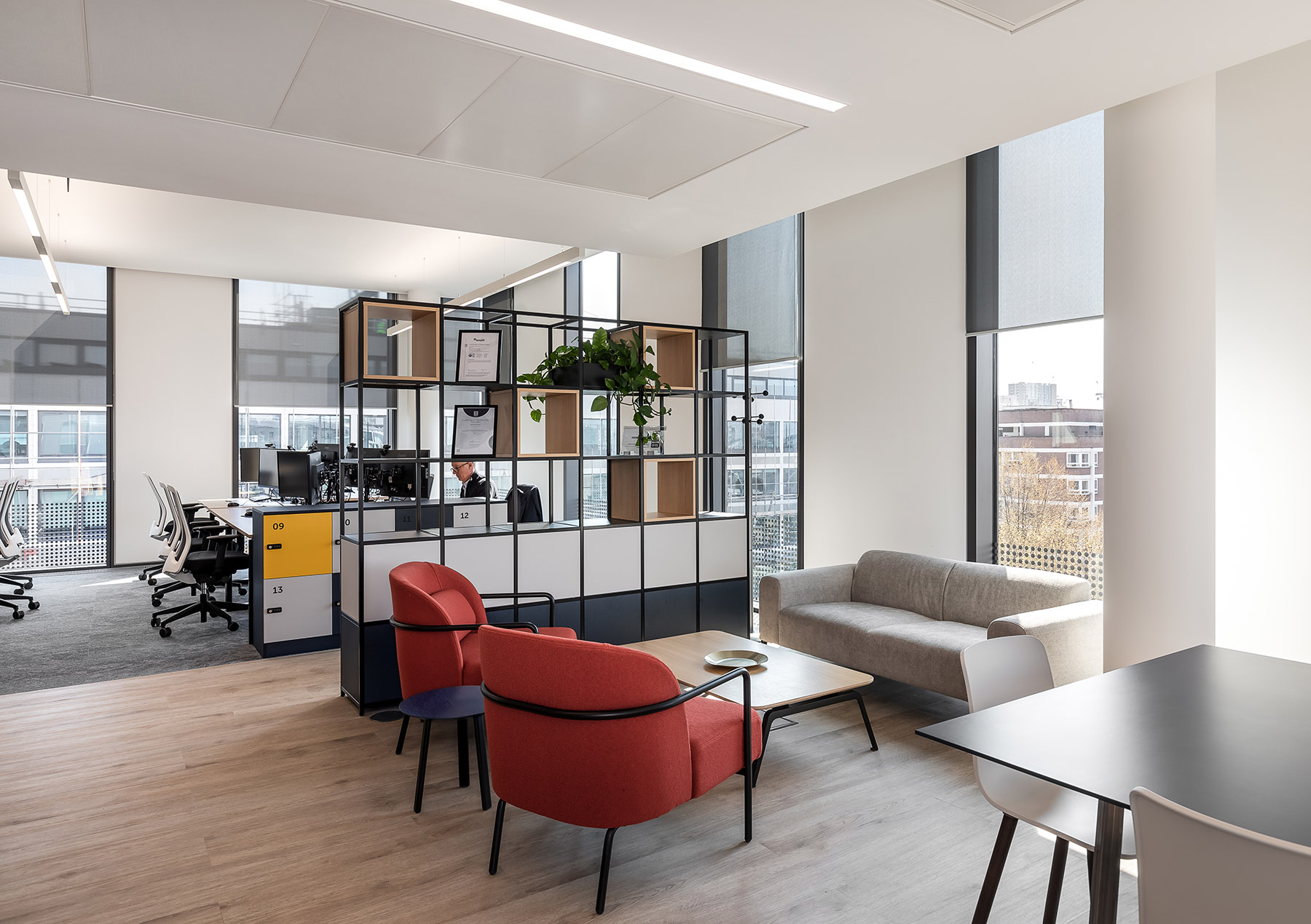 The Reliance Cyber office, common area with sofas