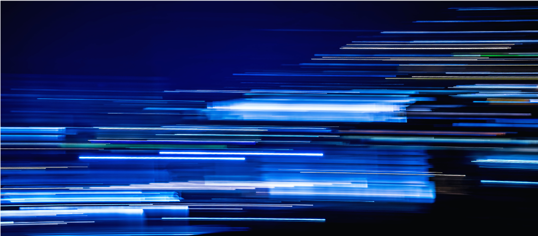 lights speeding past, blurred in navy and blue