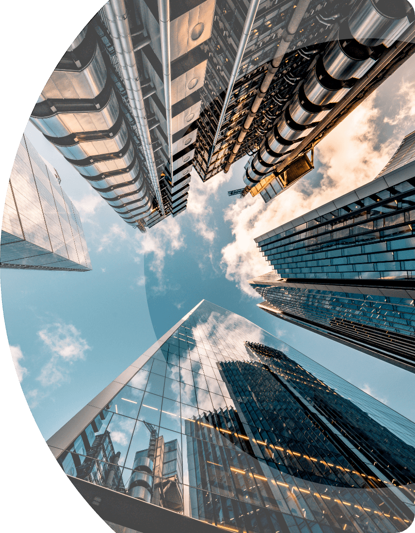 Photograph of skyscrapers from ground level looking up