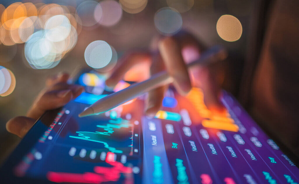 person using tablet to analyse cyber security data