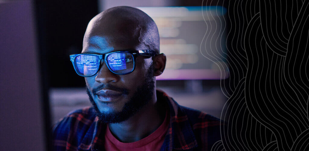 Cyber security, black man and code reflection in eyewear, hacking and software update in office. African American male employee, programmer or IT specialist with glasses, focus and cloud computing